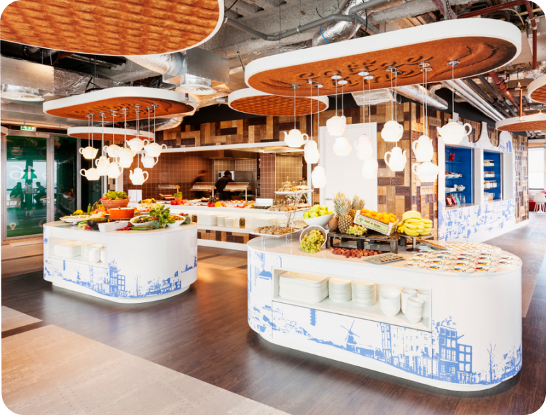 Meal Service Flexibility Cafeteria offering setup at a company with fruit and catering options