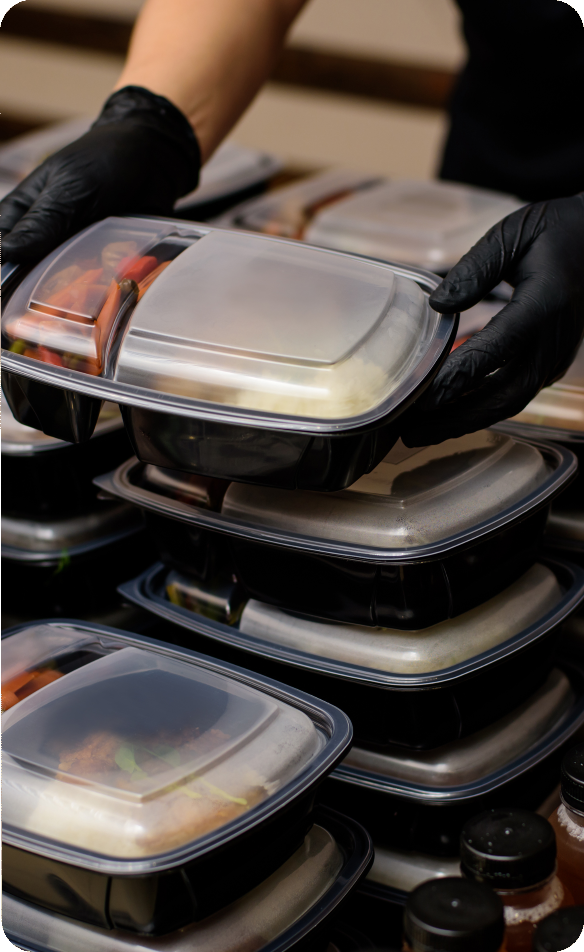 Lunch box with food in the hands. Catering Hospital Boxed Lunches