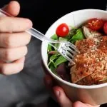 employee eating a high protein lunch at work