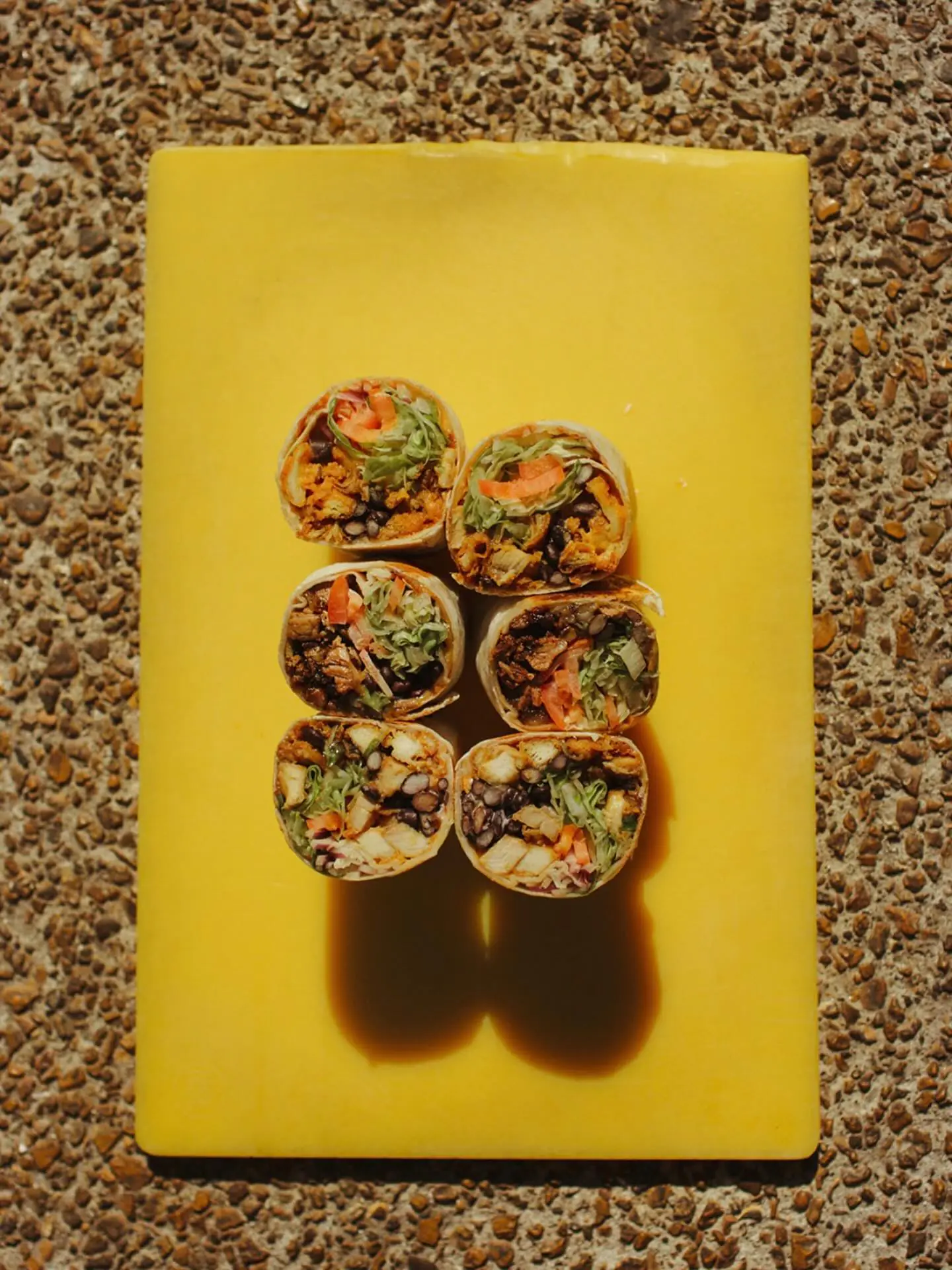 Antique Taco catering spread with artisan tacos, fresh toppings, and sides