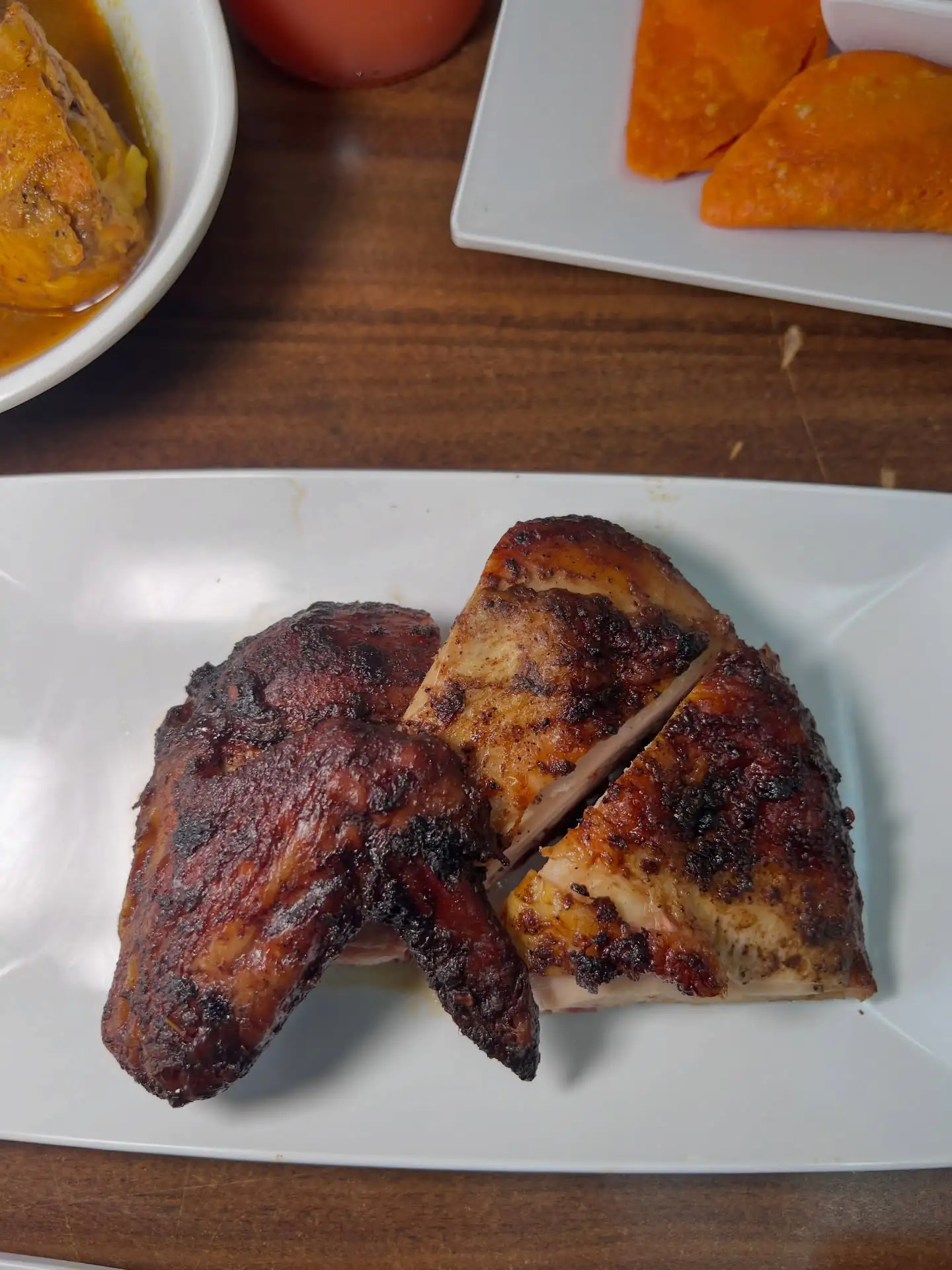 Garifuna Flava Caribbean catering with jerk chicken, plantains, and tropical sides
