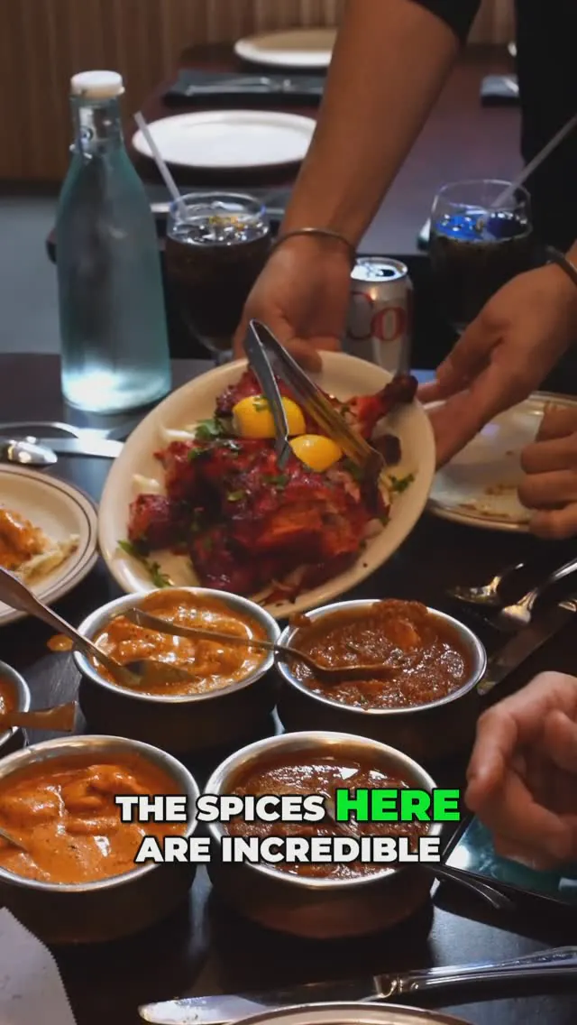 India's Grill catering spread with tikka masala, biryani, and naan