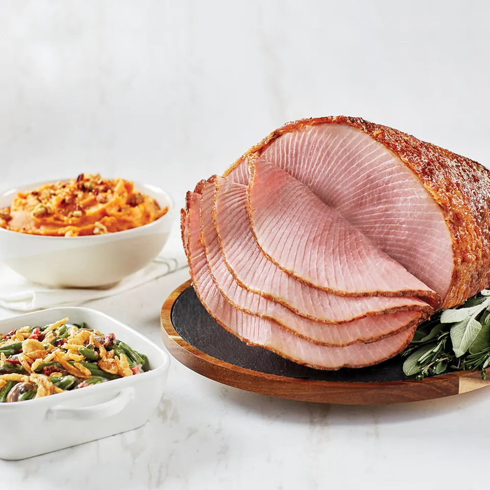Honey Baked Ham platter with sweet potato souffle and green bean casserole
