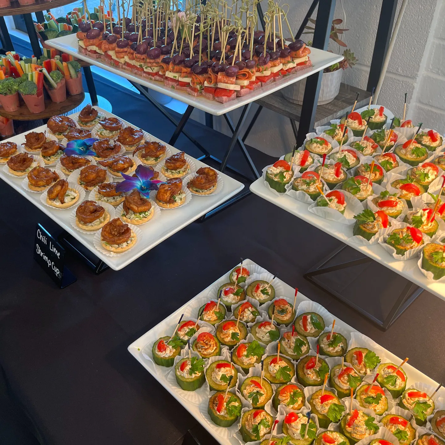 Fresh Connections Catering buffet-style setup with salads, wraps, and hot dishes for a corporate lunch