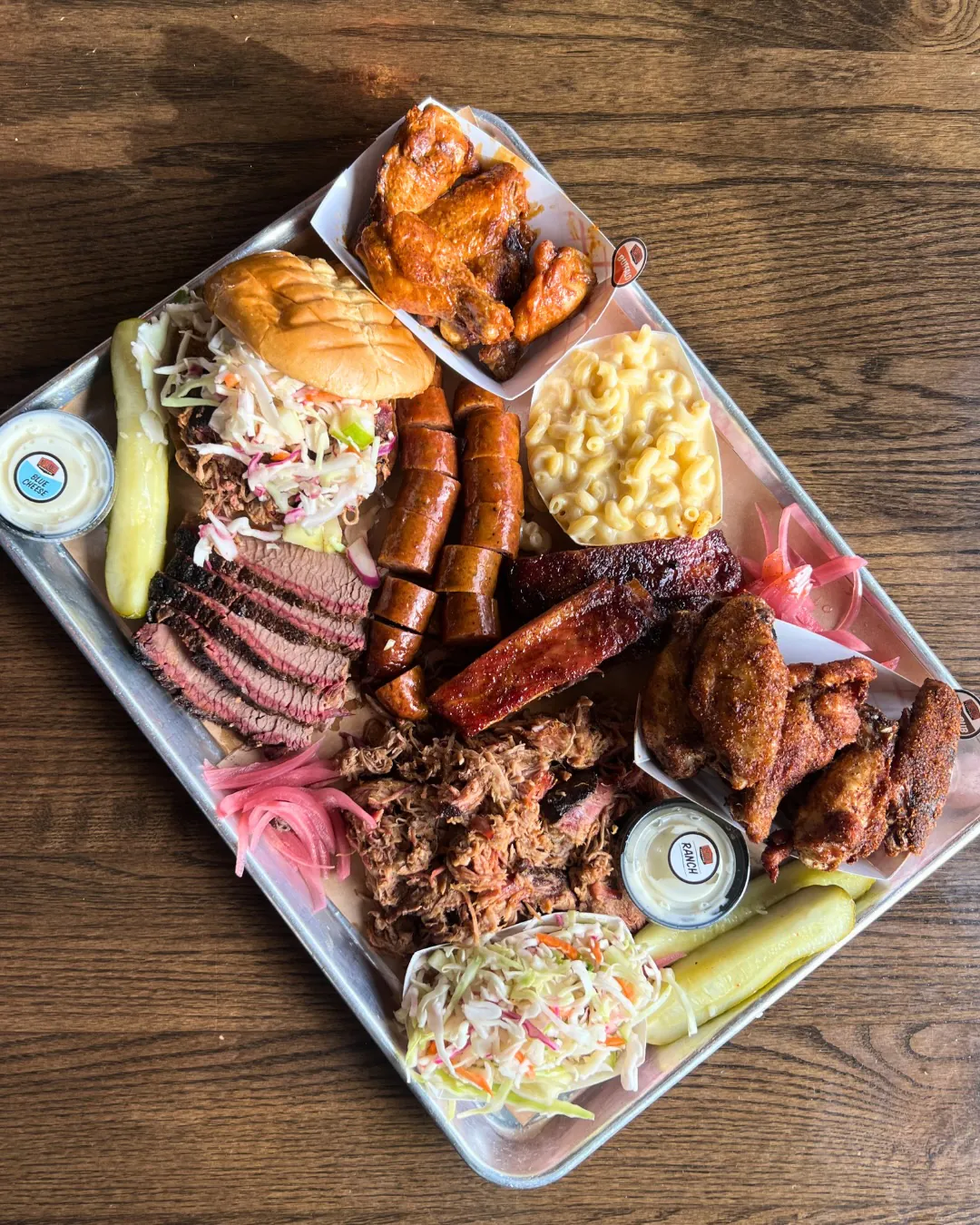 GQue BBQ championship brisket and smoked meats catering spread