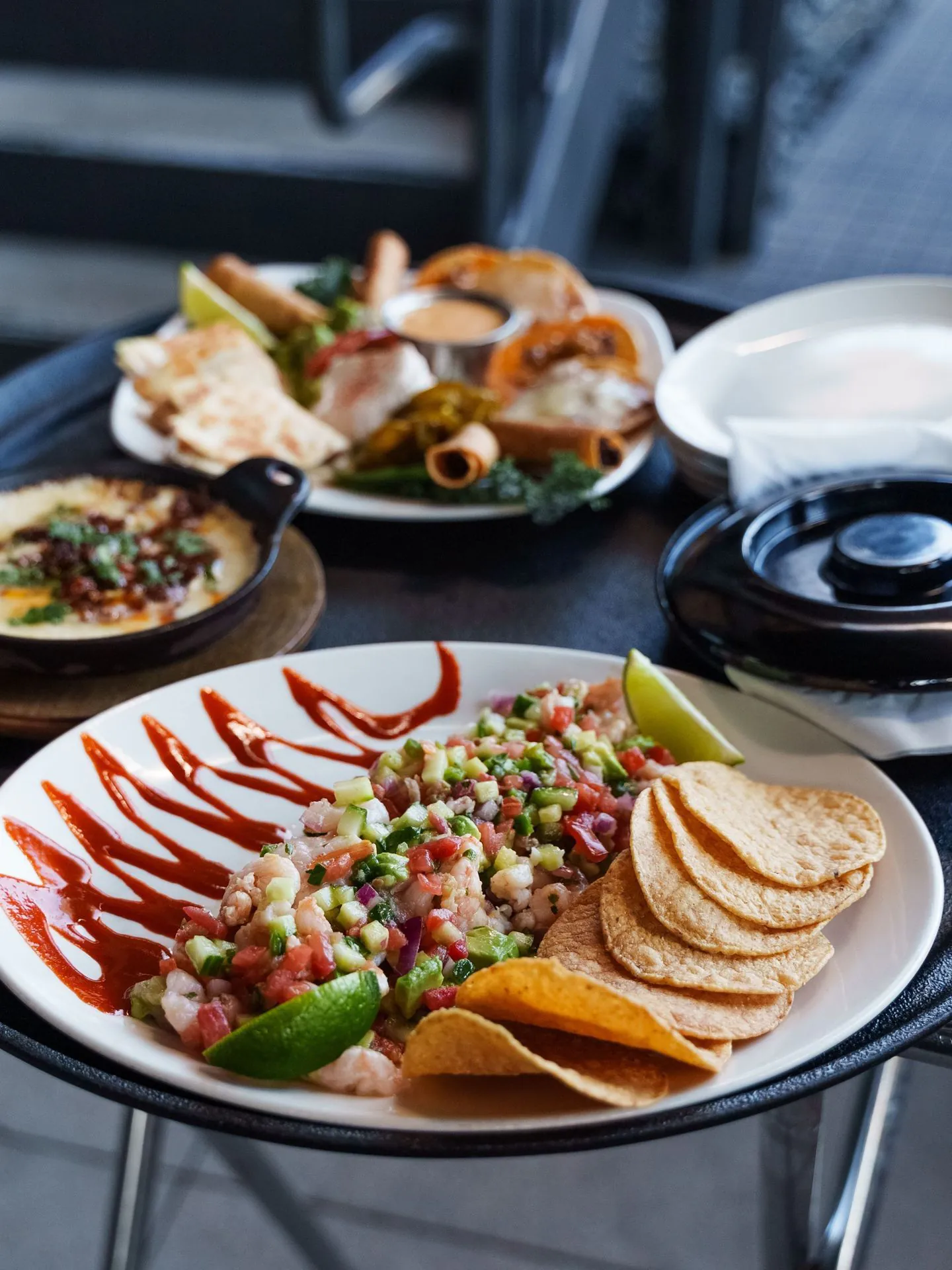 Mi Cocina Tex-Mex catering spread with fajitas, enchiladas, and sides for a Dallas event