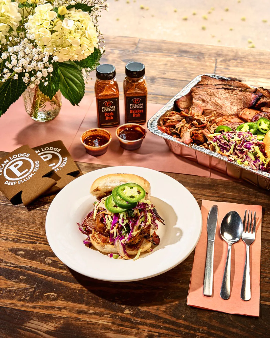 Pecan Lodge Texas brisket and smoked meats catering spread for a Dallas event