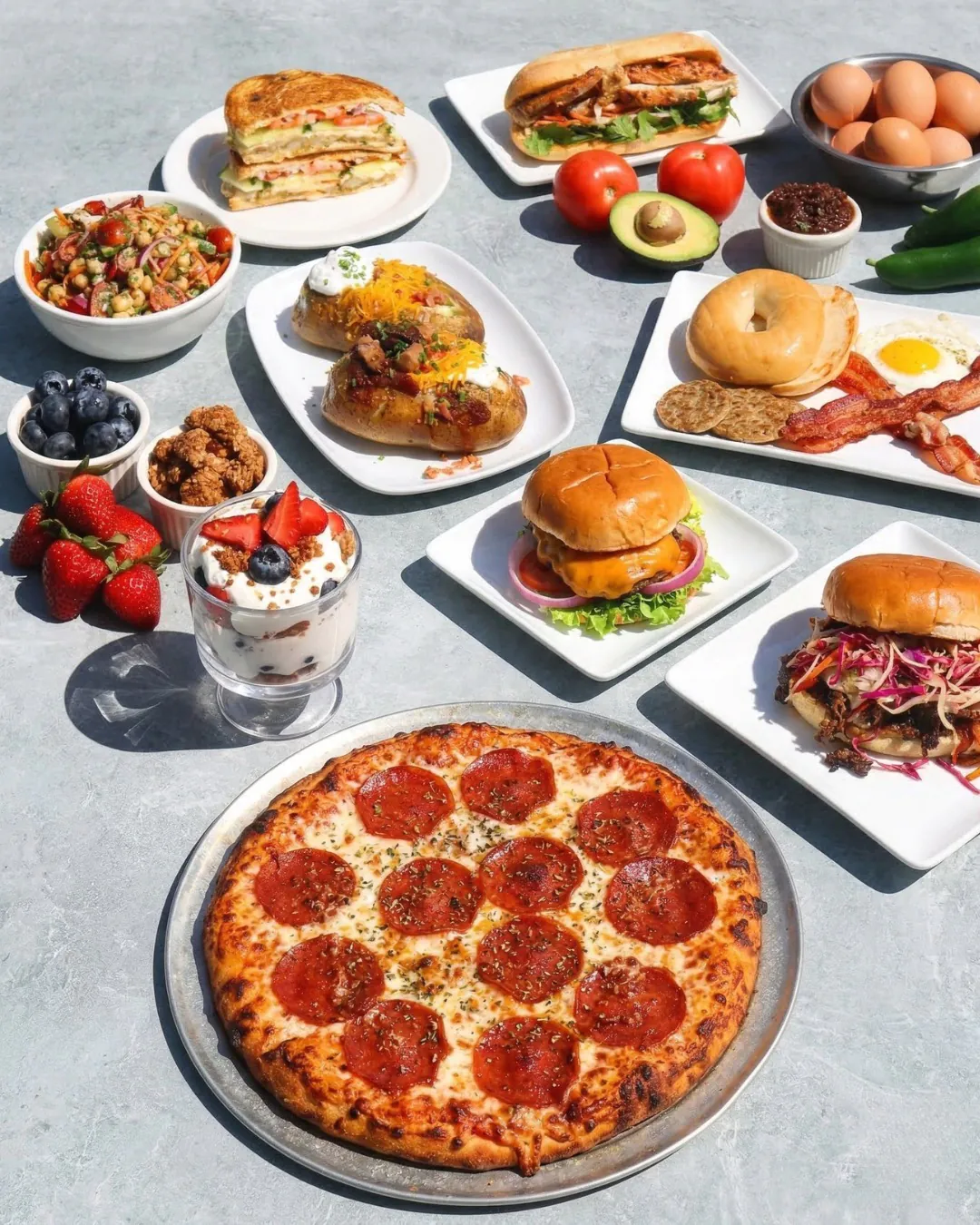 Savory Catering daily corporate lunch spread with salads and hot entrees