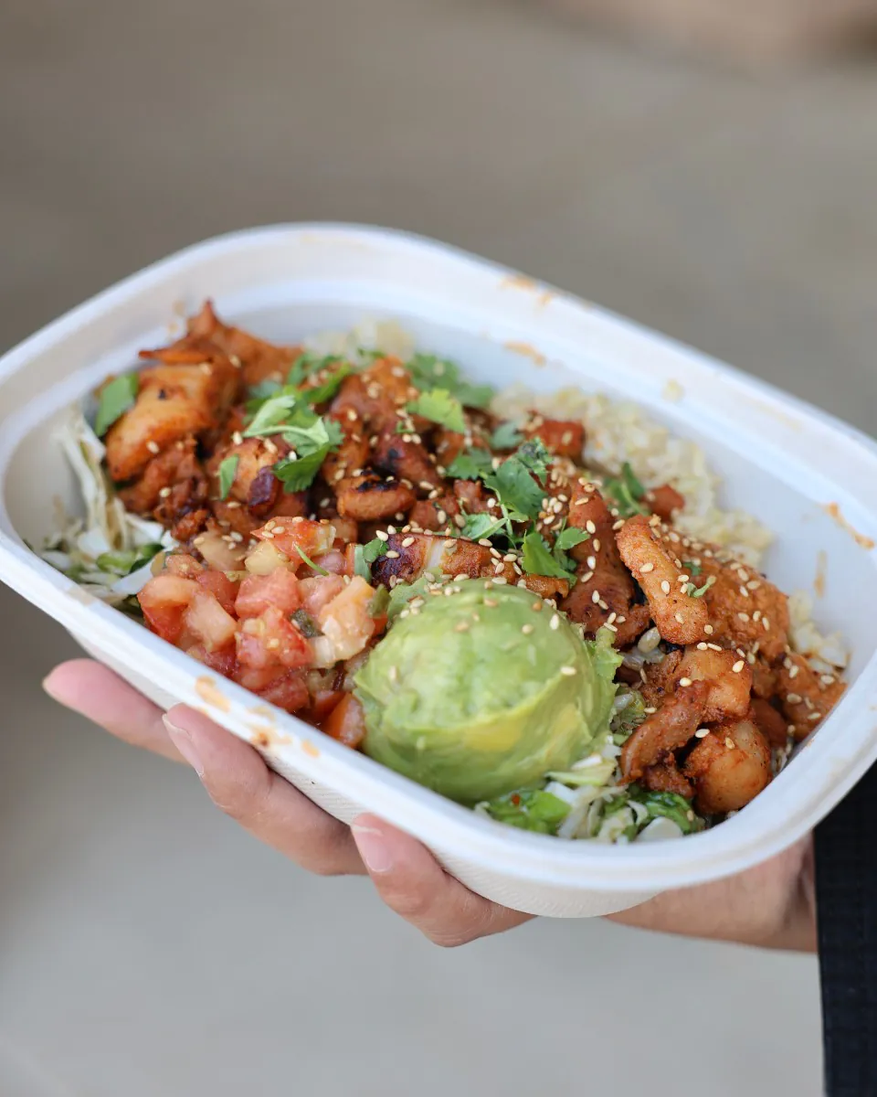 TaKorean catering bowls with Korean-Mexican fusion ingredients and fresh toppings