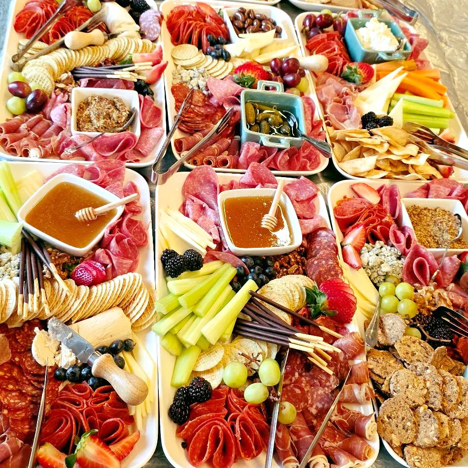 The Next Course chef-prepared catering spread with diverse cuisine options