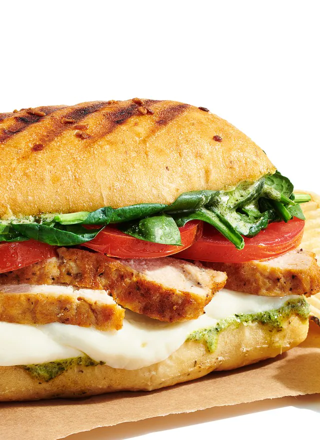 Jason's Deli grilled chicken caprese panini on toasted ciabatta with melted mozzarella, basil pesto, fresh tomato and spinach