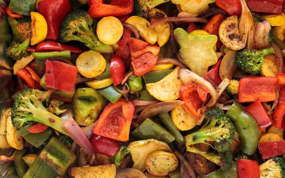 Veg Y Sofrito from Cuban Kitchen A tray of roasted bell peppers, squash, broccoli and red onions with smoked paprika