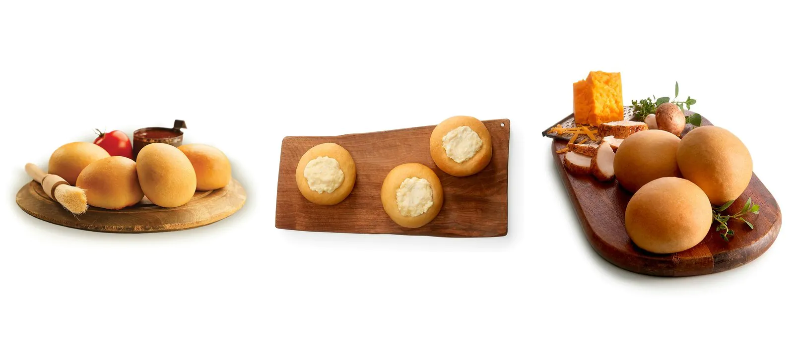 Three wooden boards of Kolache Factory kolaches: barbecue brisket kolaches with a tomato and a pot of sauce, cream cheese kolaches, and Italian chicken kolaches with cheddar, mushrooms and sliced chicken