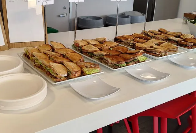 Sandwich platters on an office kitchen counter